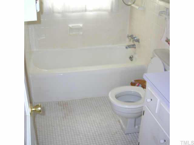 604 Chatham Lane Raleigh, NC 27610 - Photo 5 of 6 a bathroom with a sink and a toilet