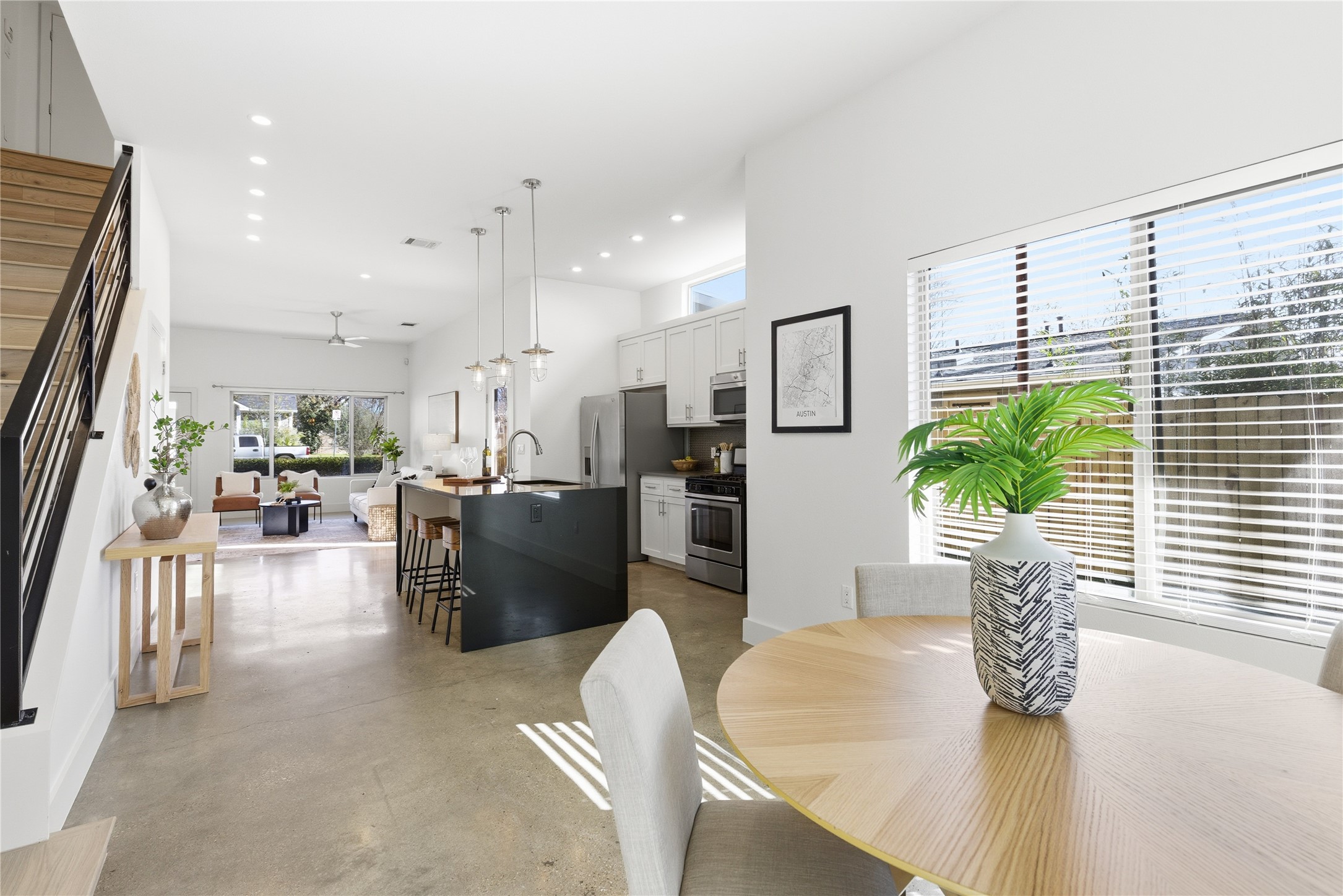 701 Zennia Street, Unit B Austin, TX 78751 - Photo 15 of 40 Dining space featuring concrete floors, recessed lighting, stairs, and a ceiling fan