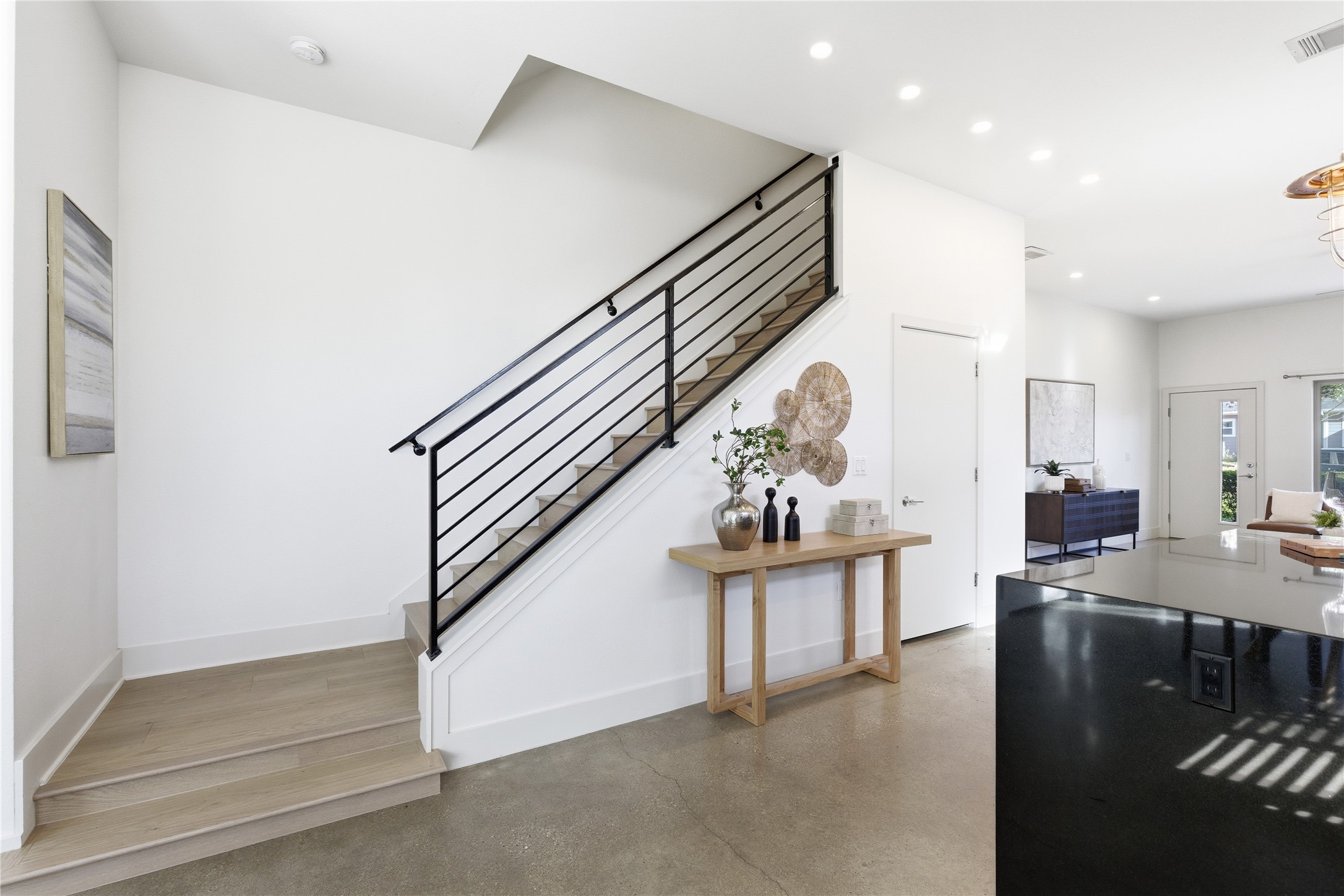 701 Zennia Street, Unit B Austin, TX 78751 - Photo 17 of 40 Staircase featuring recessed lighting and finished concrete floors