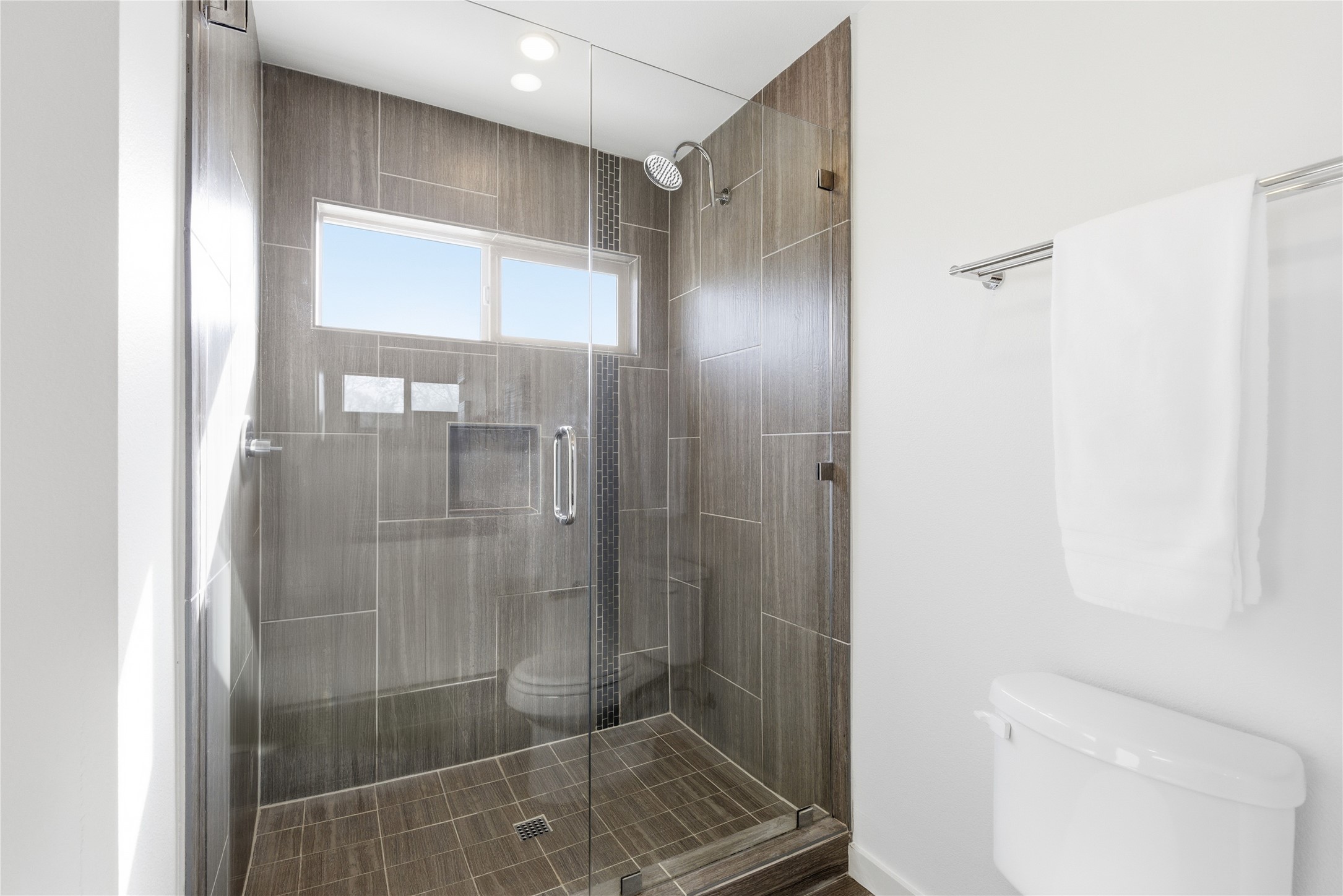 701 Zennia Street, Unit B Austin, TX 78751 - Photo 21 of 40 Full bathroom featuring a shower stall and recessed lighting