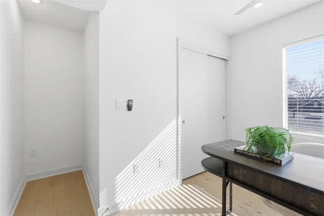 a view of a room with a table and chair