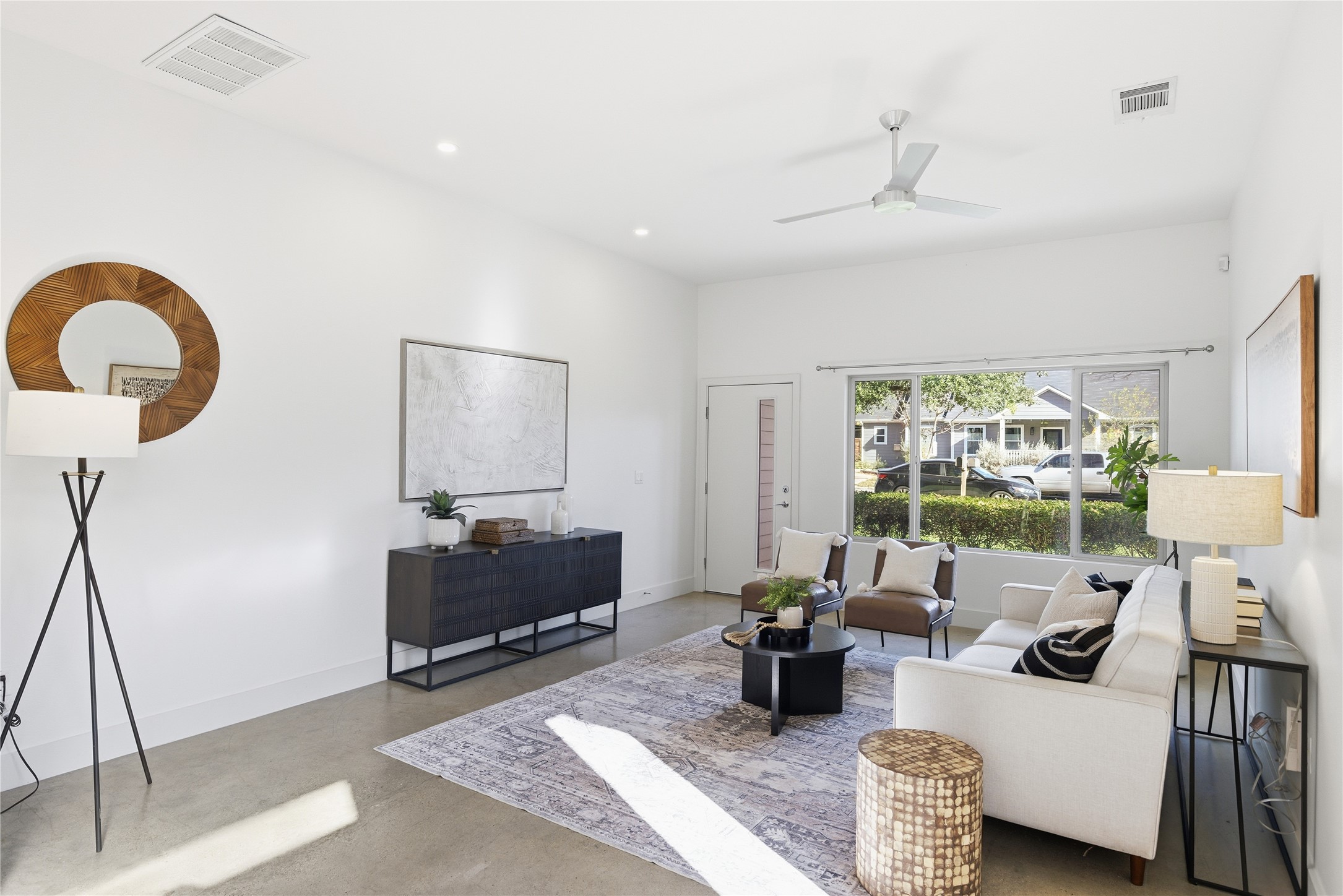 701 Zennia Street, Unit B Austin, TX 78751 - Photo 5 of 40 Living room with concrete floors, ceiling fan, and recessed lighting