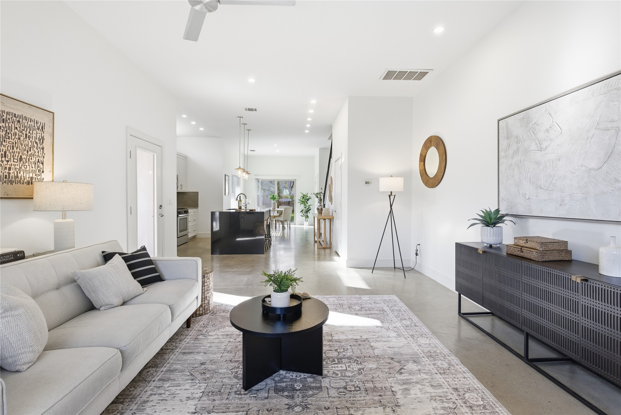 701 Zennia Street, Unit B Austin, TX 78751 - Photo 10 of 40 Living room with recessed lighting, finished concrete flooring, and a ceiling fan