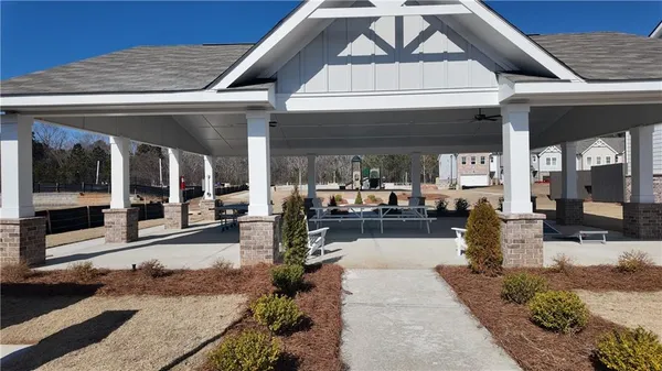a view of a lobby with chair and tables