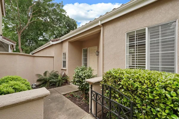 a house with a yard and sitting space