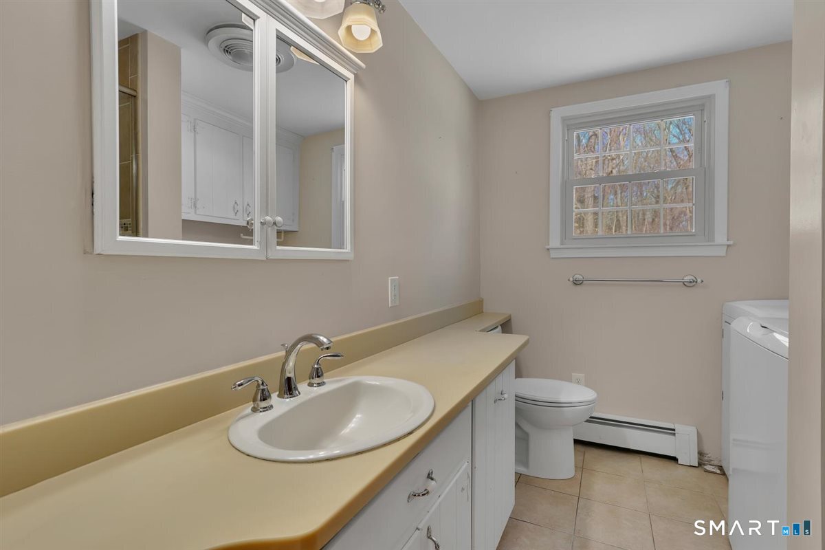 408 Foote Road Glastonbury, CT 06073 - Photo 16 of 30 first floor bath w/ laundry