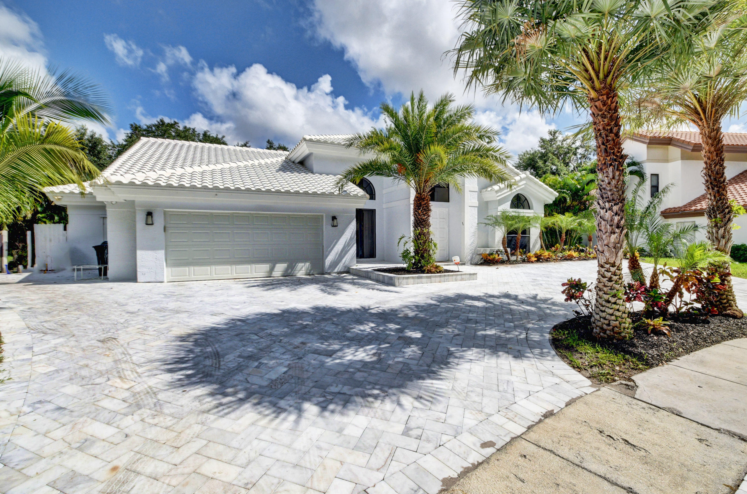 2516 Northwest 44th Court Boca Raton, FL 33434 - Photo 3 of 62 SIDE LOOK