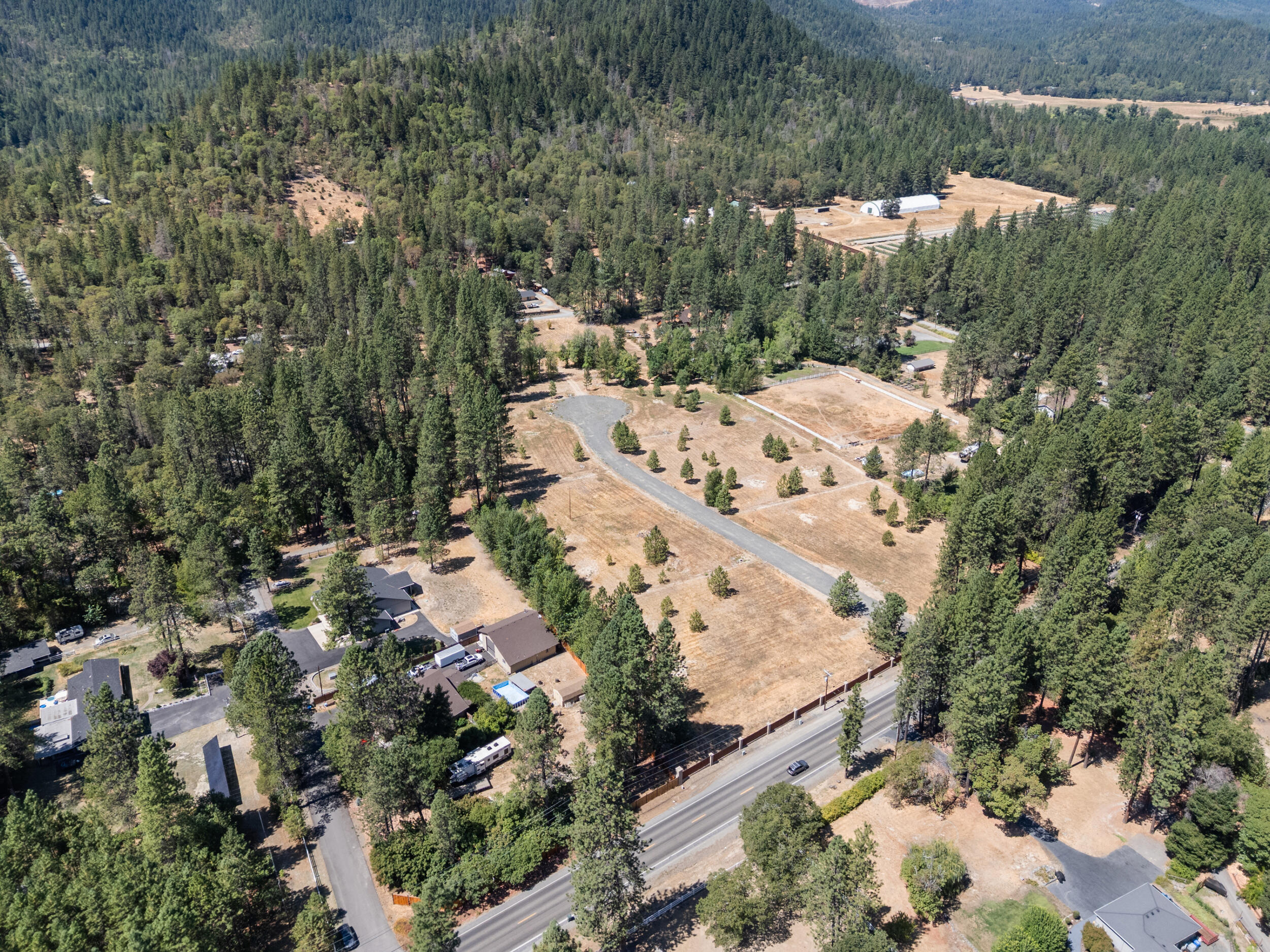 256 Deruyte Way Rogue River, OR 97537 - Photo 7 of 7 an aerial view of residential houses with outdoor space