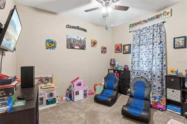 a bedroom with bed and a window