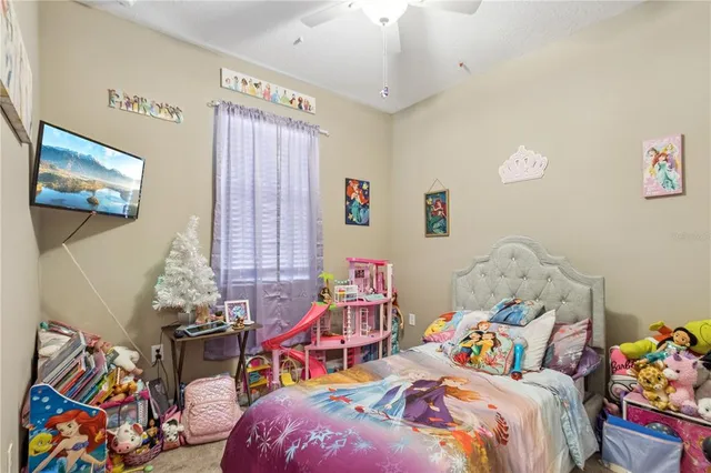a view of a patio with a dining table and chairs