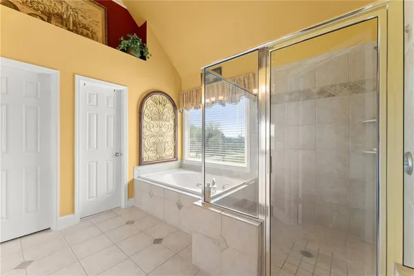 a bathroom with a sink vanity and a mirror