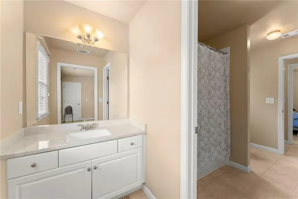 a kitchen with a window a refrigerator and a window