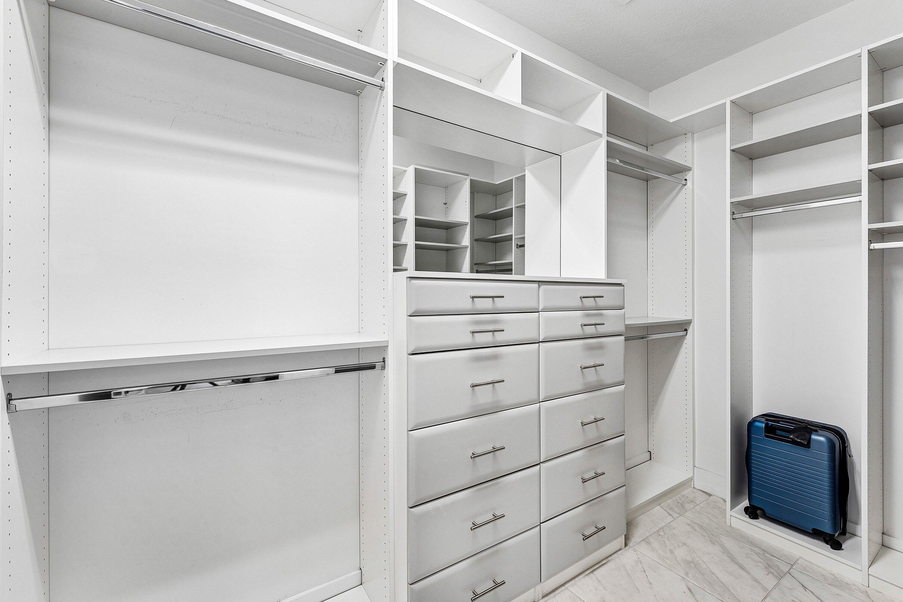 4821 Pointe Midtown Road Palm Beach Gardens, FL 33418 - Photo 15 of 34 Primary Closet w Custom Built-Ins