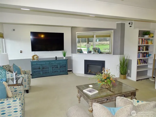 a room with gym equipment and view of bathroom