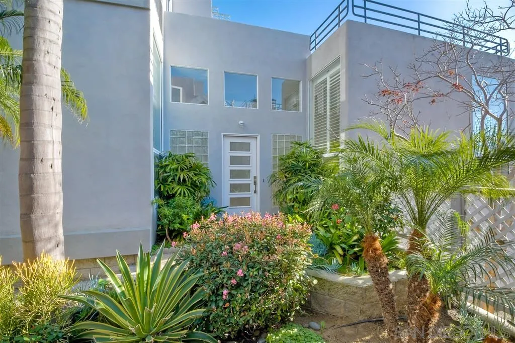 2136 Glasgow Avenue Cardiff, CA 92007 - Photo 3 of 25 a front view of a house with a garden