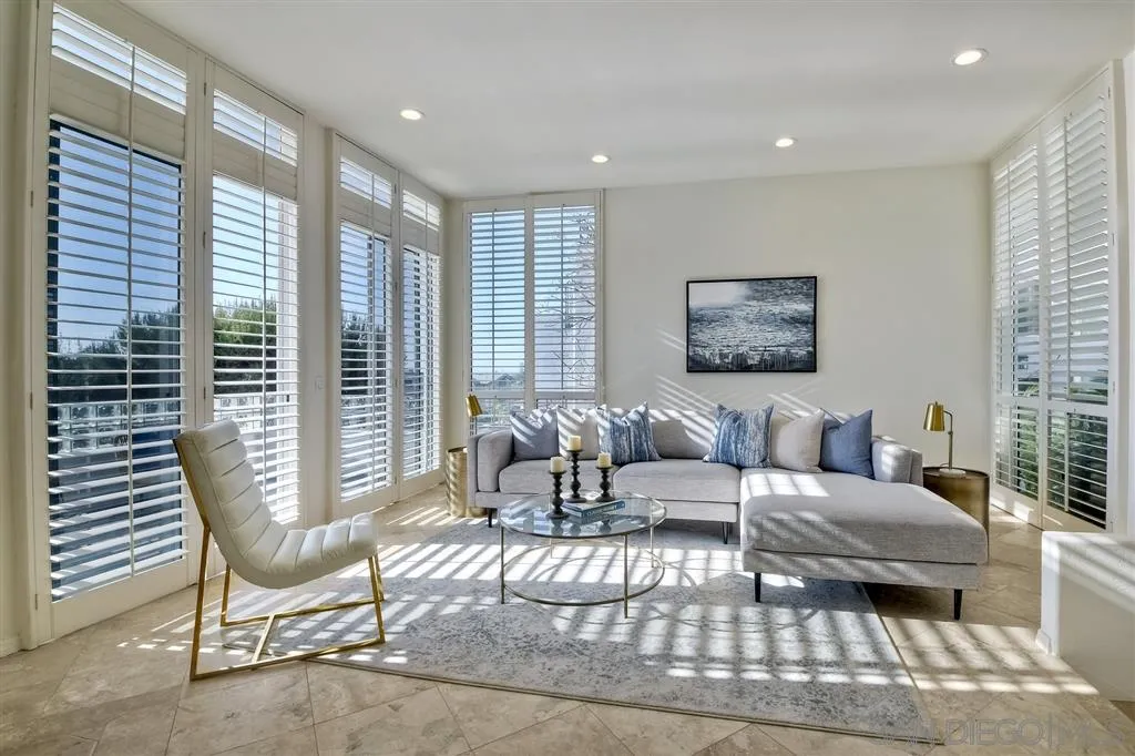 2136 Glasgow Avenue Cardiff, CA 92007 - Photo 5 of 25 a living room with furniture and a large window