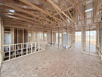 a view of an empty room with windows