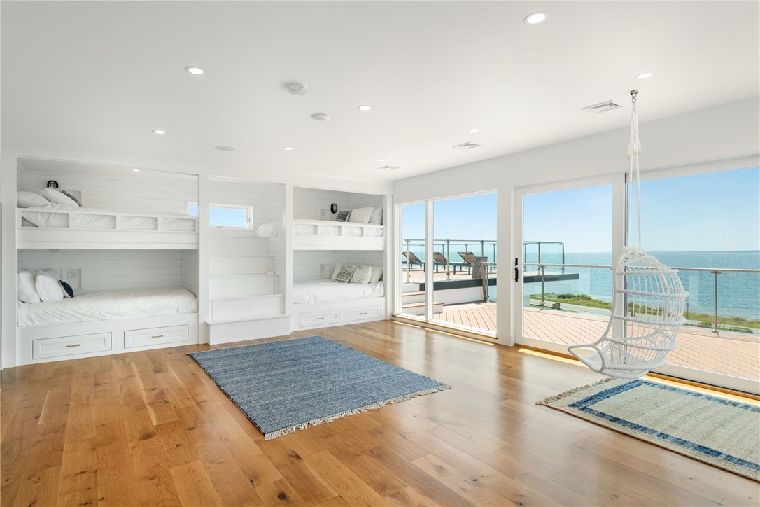 511 Ocean Avenue Newport, RI 02840 - Photo 36 of 45 5th Bedroom- (4) QUEEN BEDS (YES, FOUR QUEEN BEDS), Full bath and large Sundeck - 3rd floor suite.