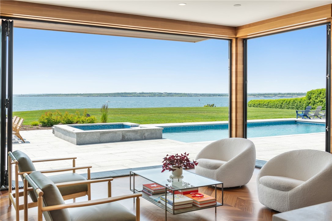 511 Ocean Avenue Newport, RI 02840 - Photo 6 of 45 Sliding Glass walls- Open to Patio