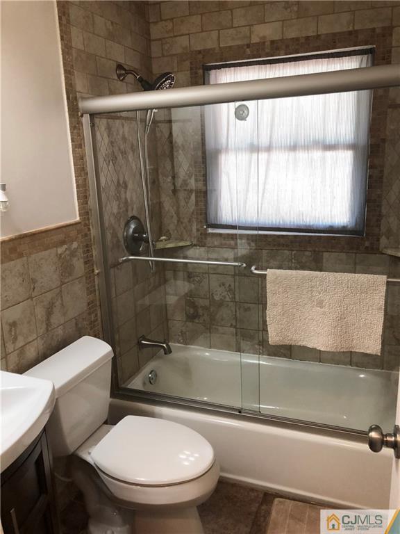 144 Kimberly Road Colonia, NJ 07067 - Photo 20 of 27 a bathroom with a toilet and a shower