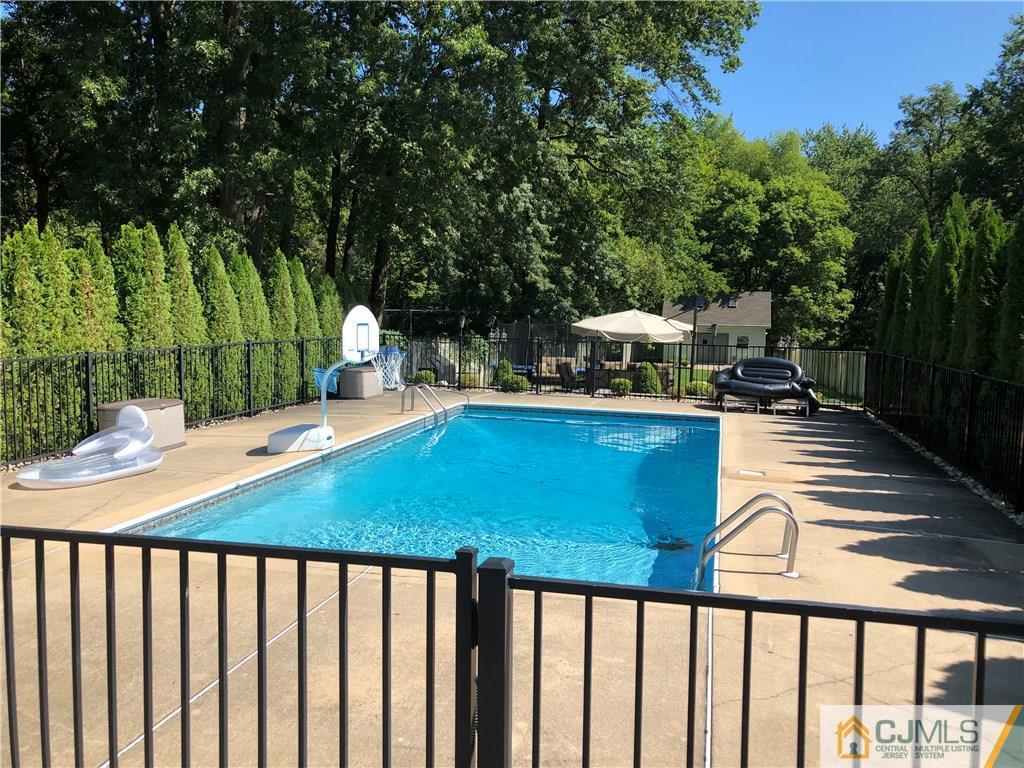 144 Kimberly Road Colonia, NJ 07067 - Photo 22 of 27 a view of a balcony with chairs