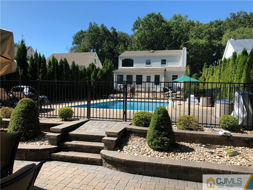 144 Kimberly Road Colonia, NJ 07067 - Photo 25 of 27 swimming pool view with a seating space