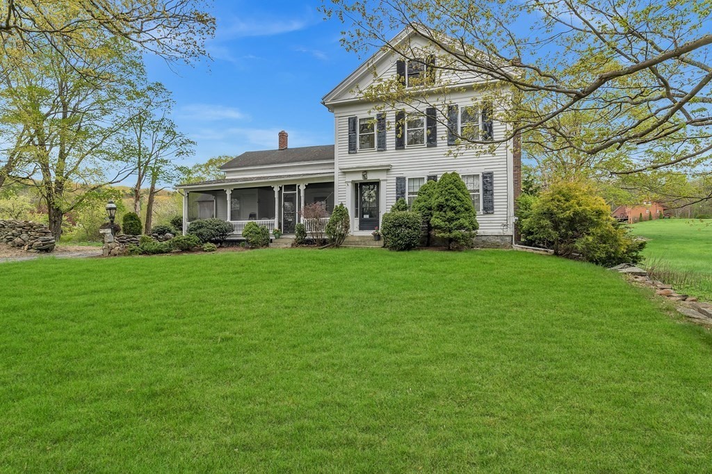 175 Brimfield Road Monson, MA 01057 - Photo 2 of 41 a front view of a house with a yard