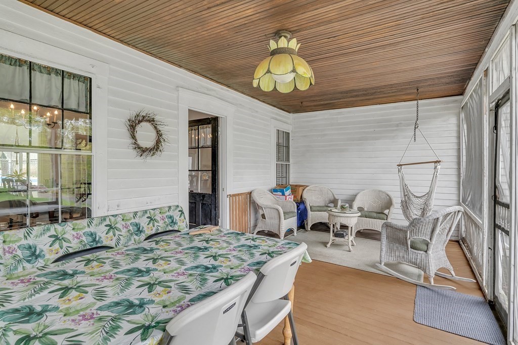 175 Brimfield Road Monson, MA 01057 - Photo 26 of 41 a view of a dining room with furniture window and wooden floor