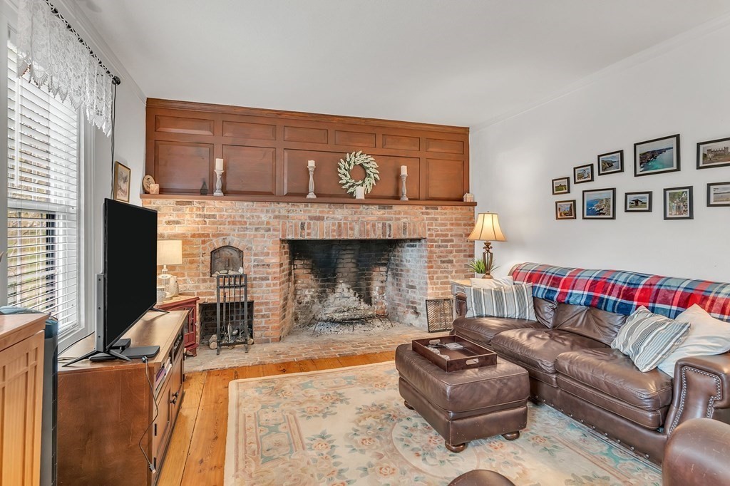 175 Brimfield Road Monson, MA 01057 - Photo 28 of 41 a living room with furniture and a fireplace