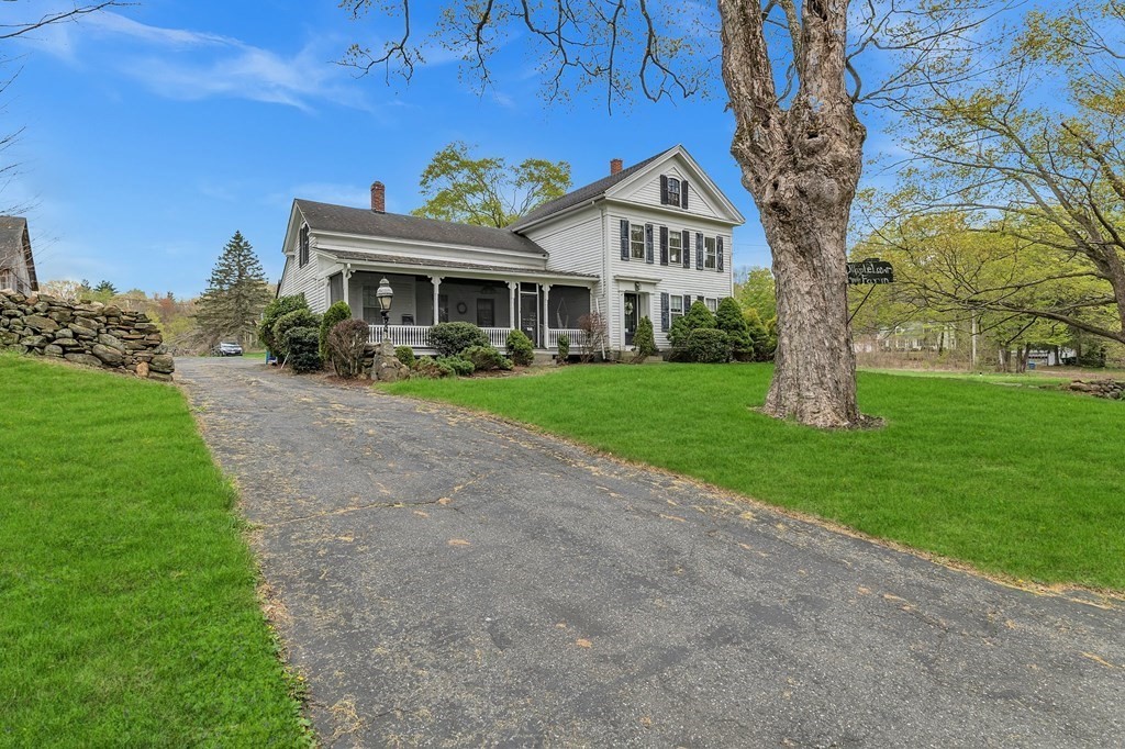 175 Brimfield Road Monson, MA 01057 - Photo 3 of 41 a front view of a house with garden