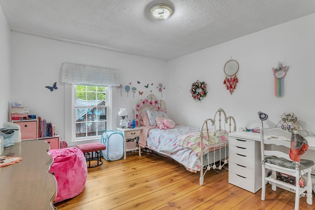 175 Brimfield Road Monson, MA 01057 - Photo 37 of 41 a bedroom with a bed and a window