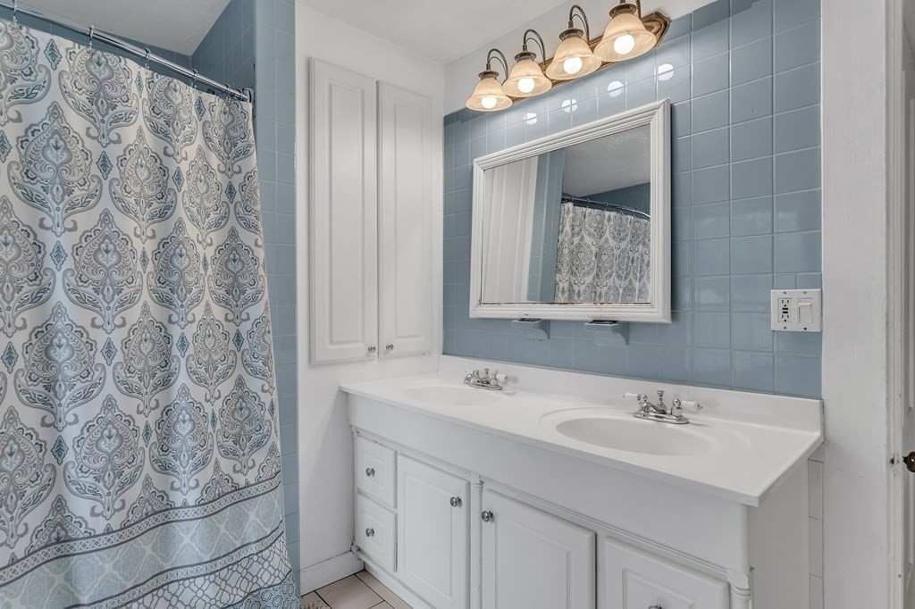 175 Brimfield Road Monson, MA 01057 - Photo 38 of 41 a bathroom with a sink and a mirror