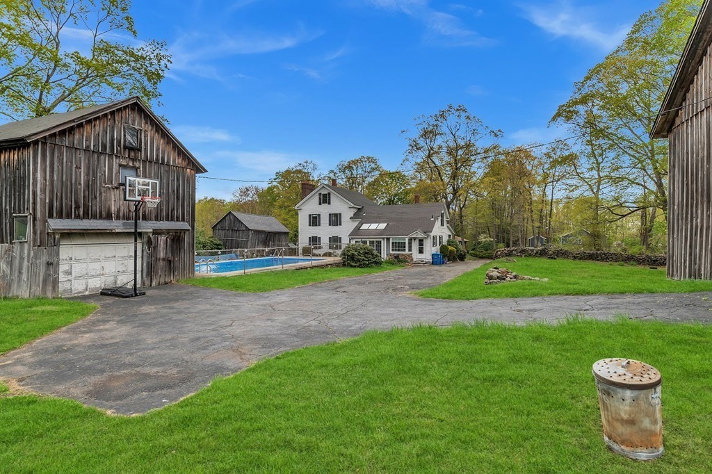 175 Brimfield Road Monson, MA 01057 - Photo 6 of 41 a view of a house with a backyard