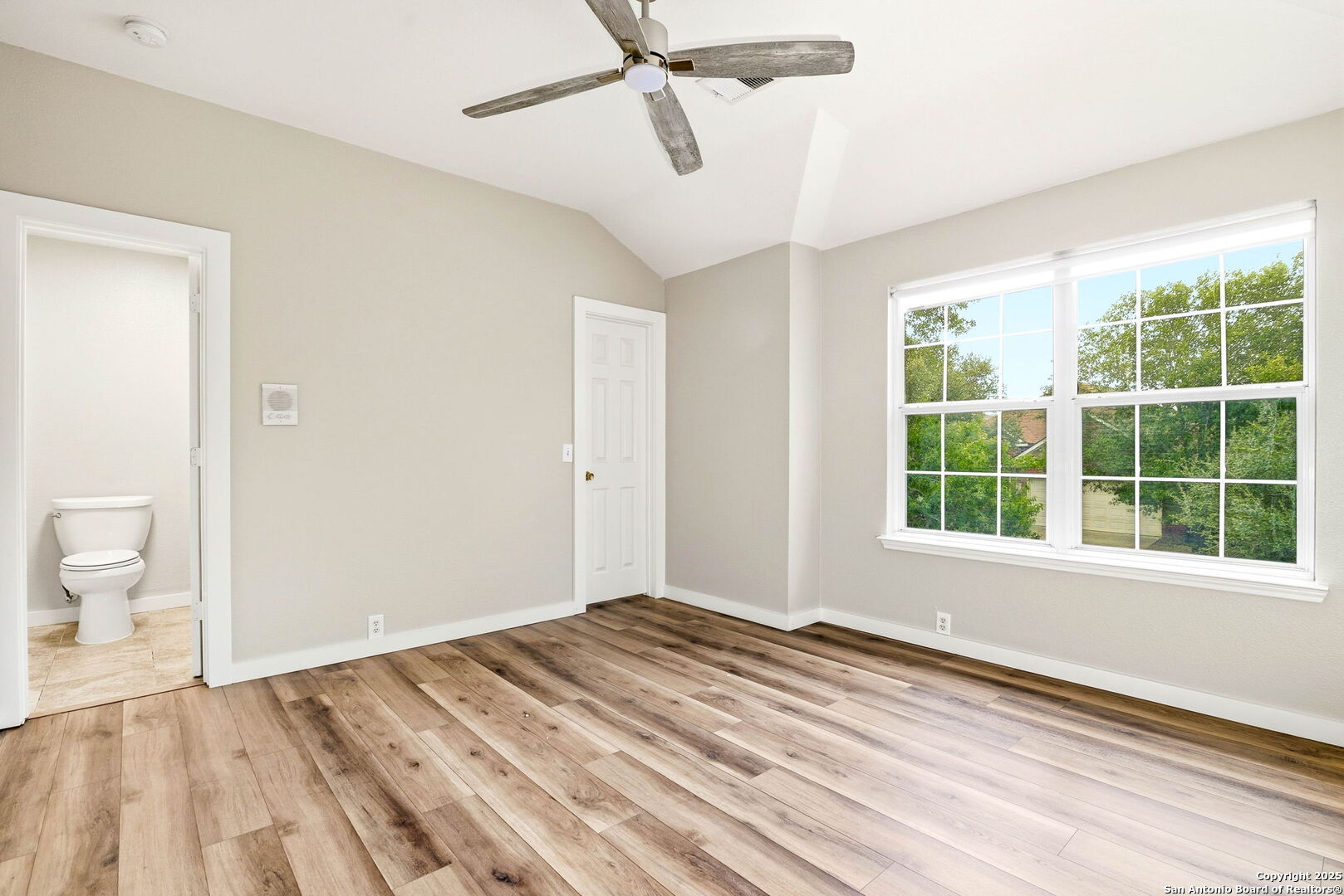 21211 Rio Sabinal San Antonio, TX 78259 - Photo 18 of 31 a view of empty room with wooden floor and fan