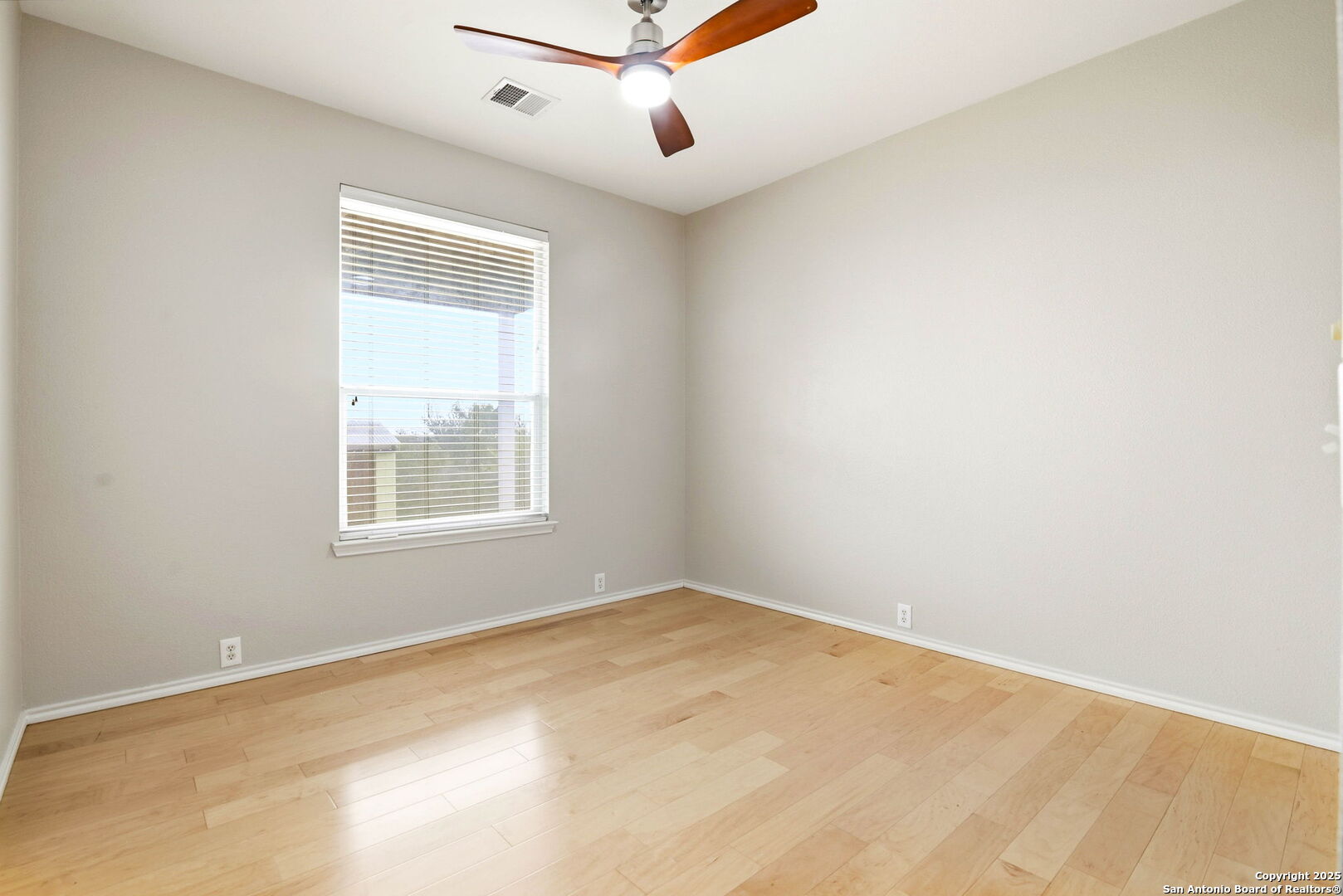 21211 Rio Sabinal San Antonio, TX 78259 - Photo 23 of 31 an empty room with a window