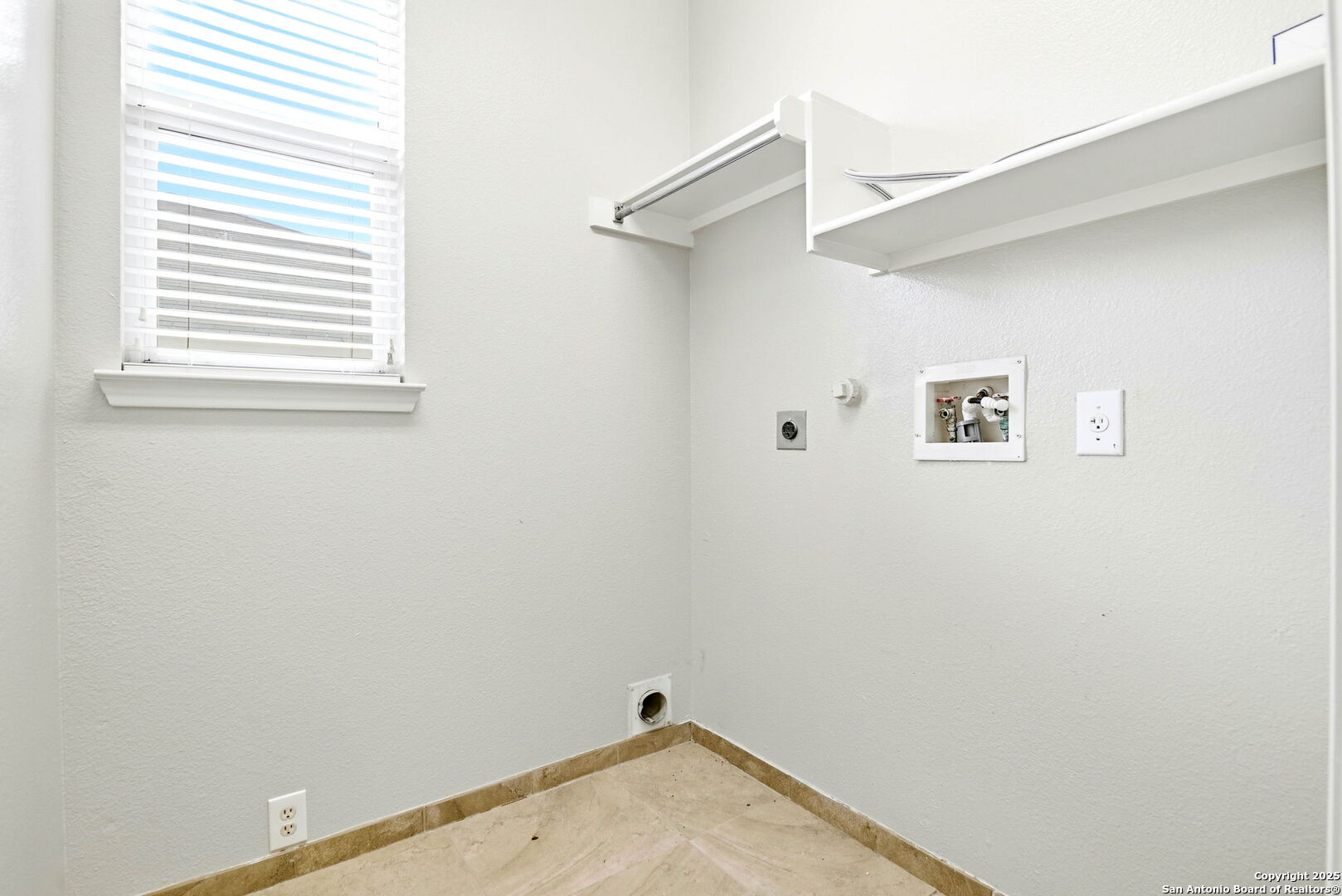 21211 Rio Sabinal San Antonio, TX 78259 - Photo 25 of 31 a view of a small space with a window and a fan