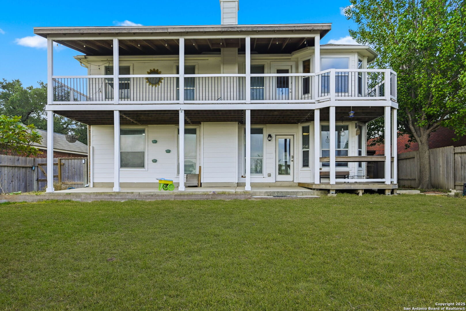 21211 Rio Sabinal San Antonio, TX 78259 - Photo 27 of 31 a front view of a building with a garden
