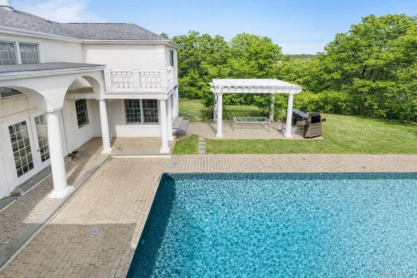 a view of a house with swimming pool