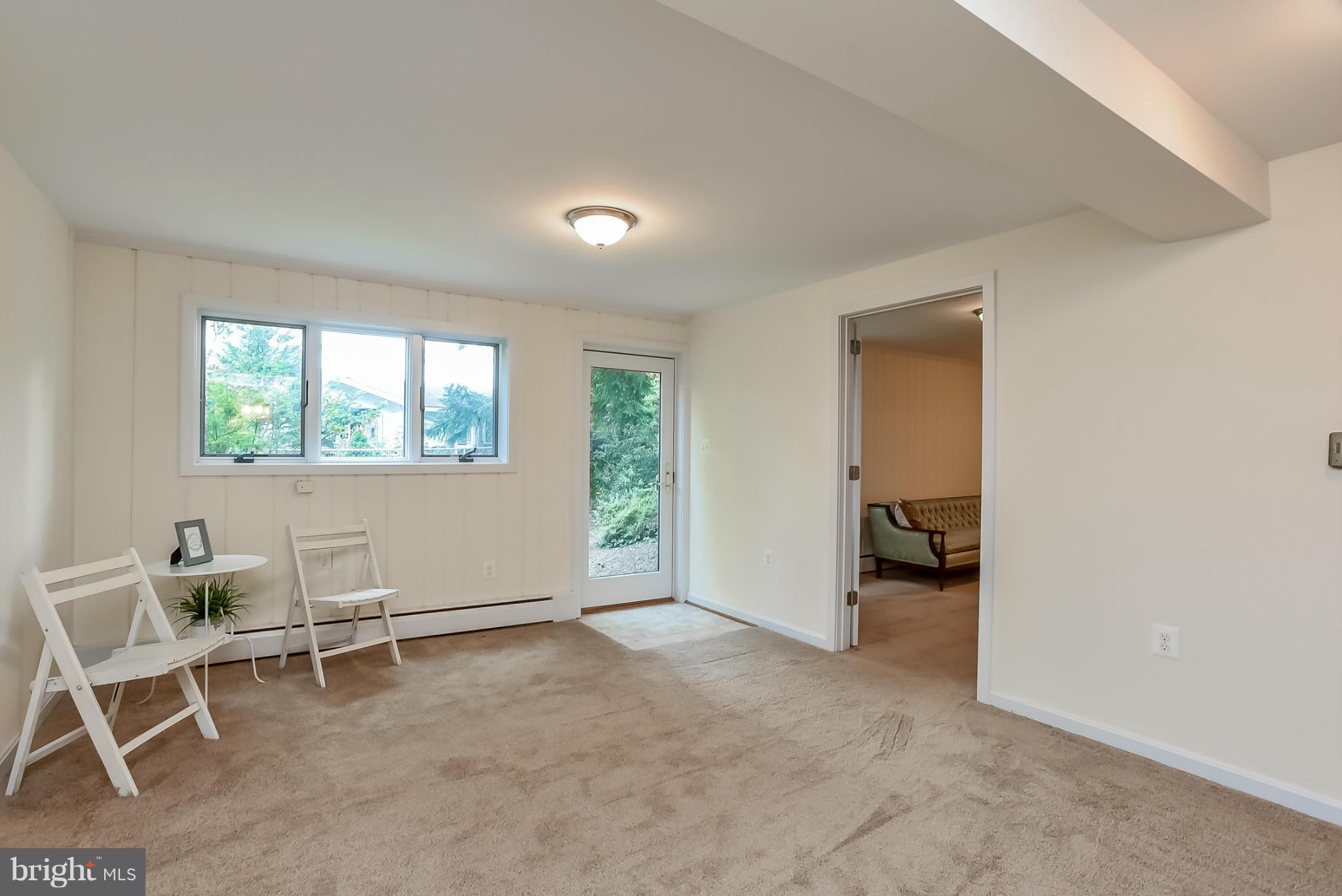 3502 Old Post Road Fairfax, VA 22030 - Photo 23 of 30 Door from lower level lounge leads to side yard.
