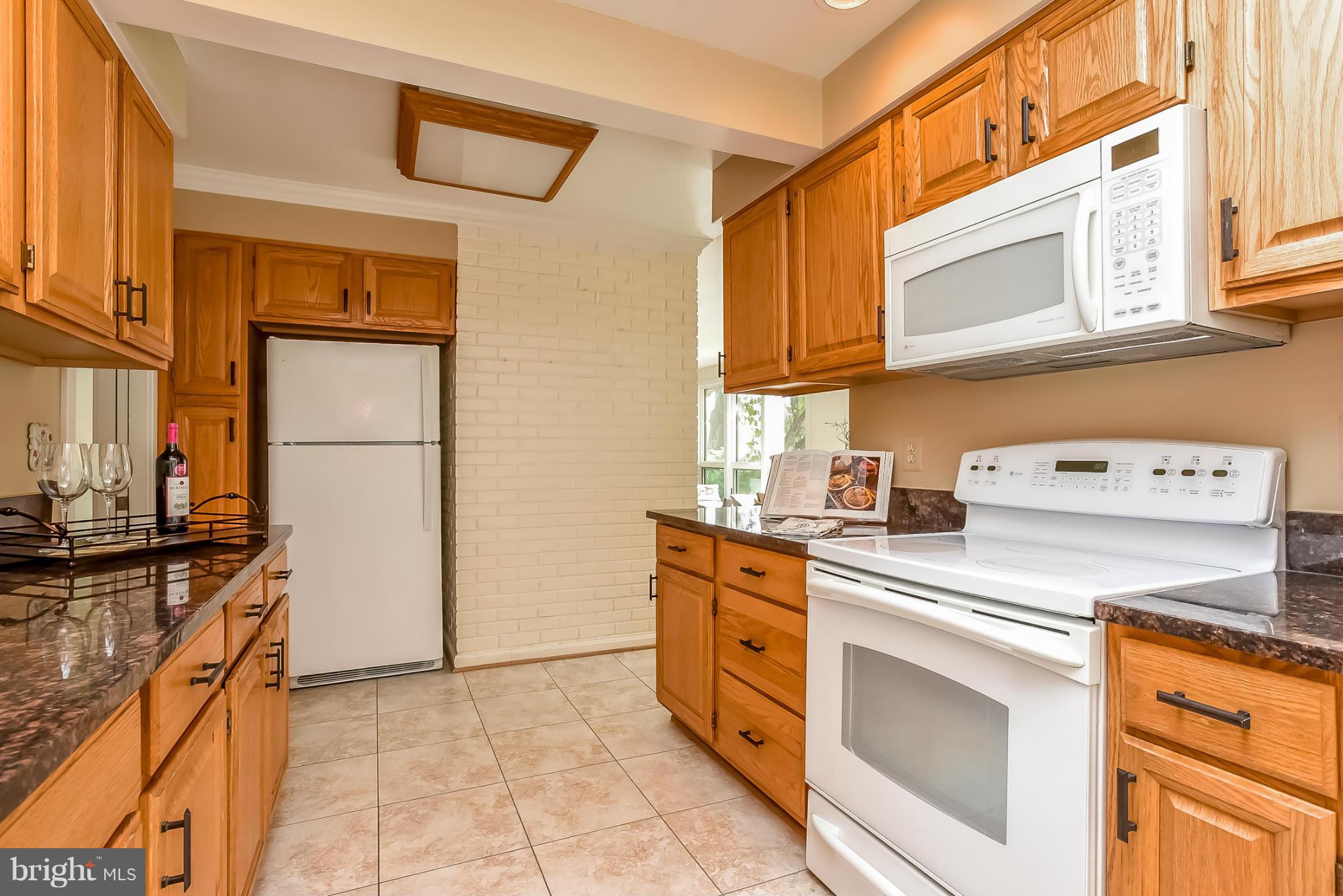 3502 Old Post Road Fairfax, VA 22030 - Photo 6 of 30 The kitchen has upgraded cabinets and granite.