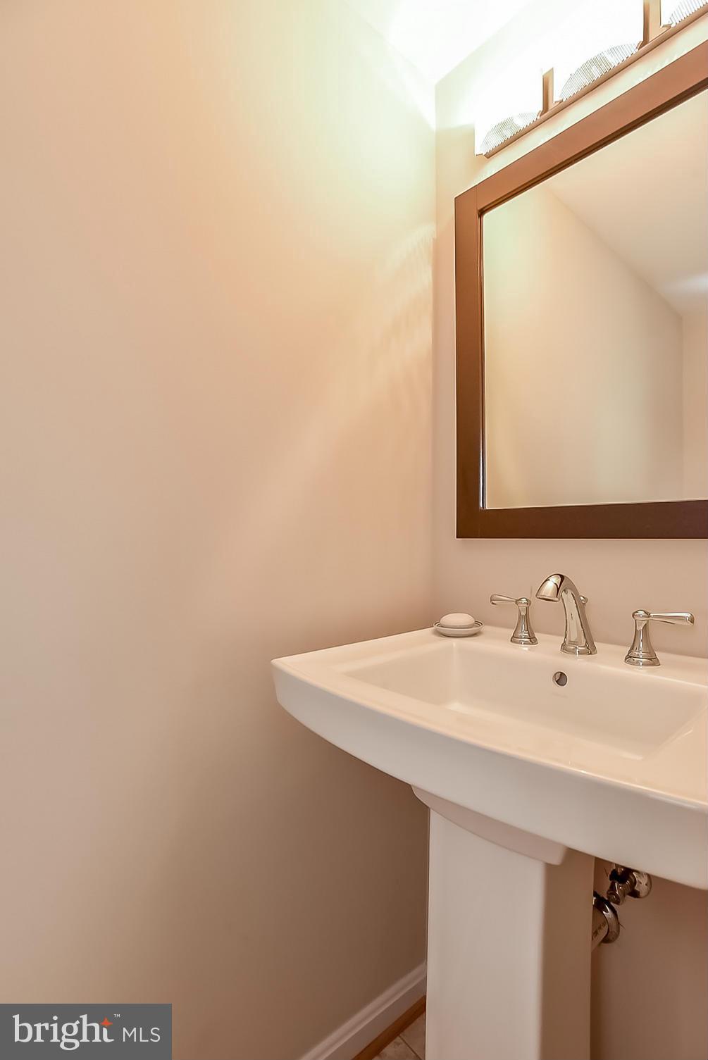 3502 Old Post Road Fairfax, VA 22030 - Photo 8 of 30 An upgraded half bath was added in 2013.