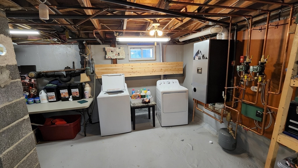 4 Fuller Road Attleboro, MA 02703 - Photo 12 of 16 a utility room with dryer and washer