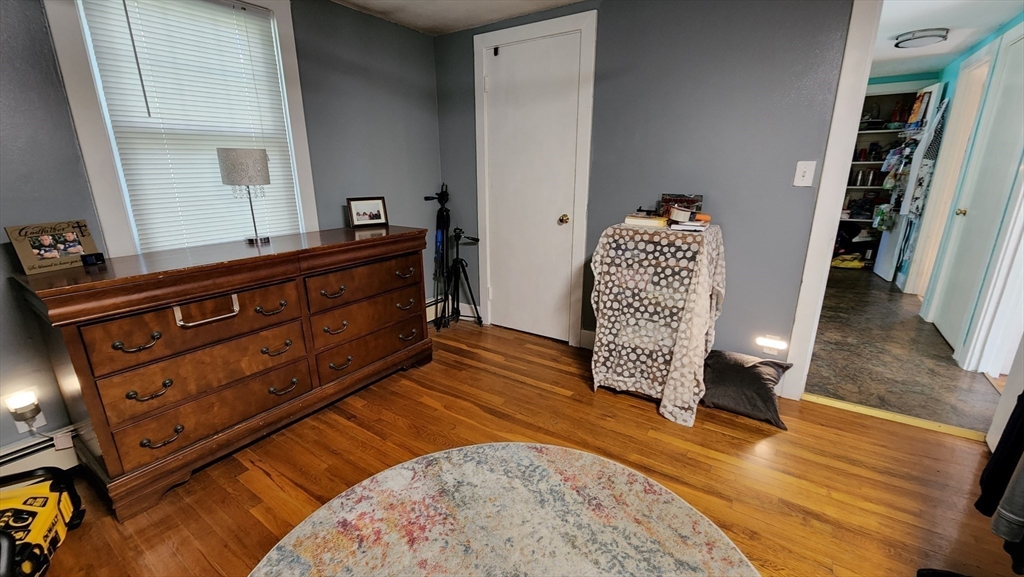 4 Fuller Road Attleboro, MA 02703 - Photo 10 of 16 a living room with furniture