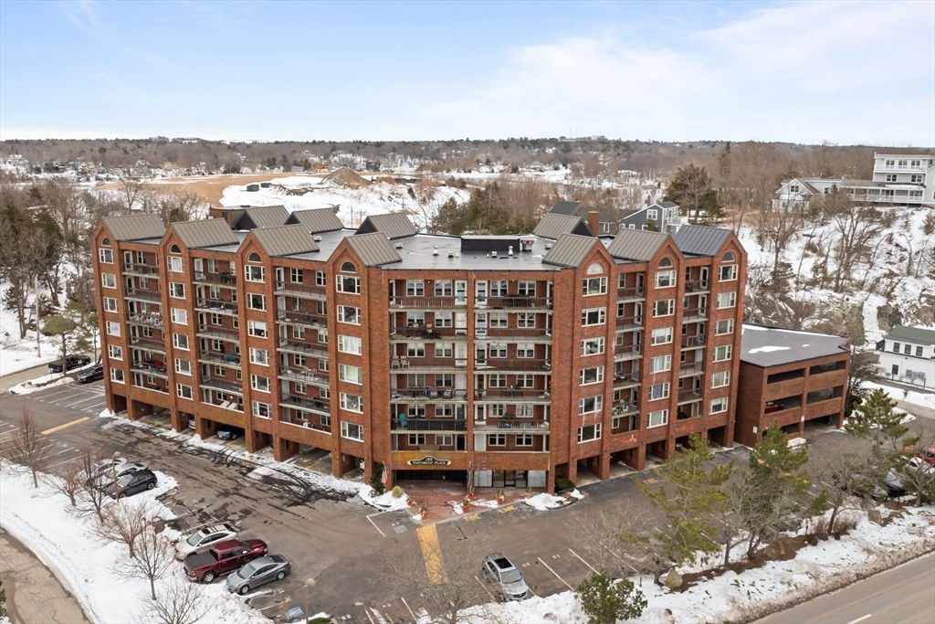 155 George Washington Boulevard, Unit 210 Hull, MA 02045 - Photo 1 of 42 a view of a city with tall buildings