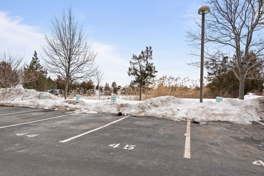 155 George Washington Boulevard, Unit 210 Hull, MA 02045 - Photo 41 of 42 a view of road covered with snow