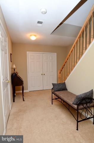 2822 Roesh Way Vienna, VA 22181 - Photo 27 of 29 Lower level hall, stairs down