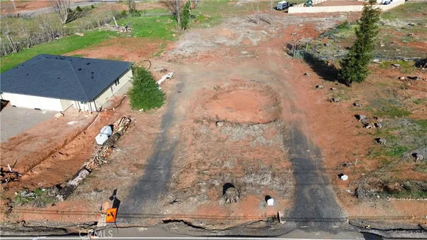 an aerial view of houses with outdoor space