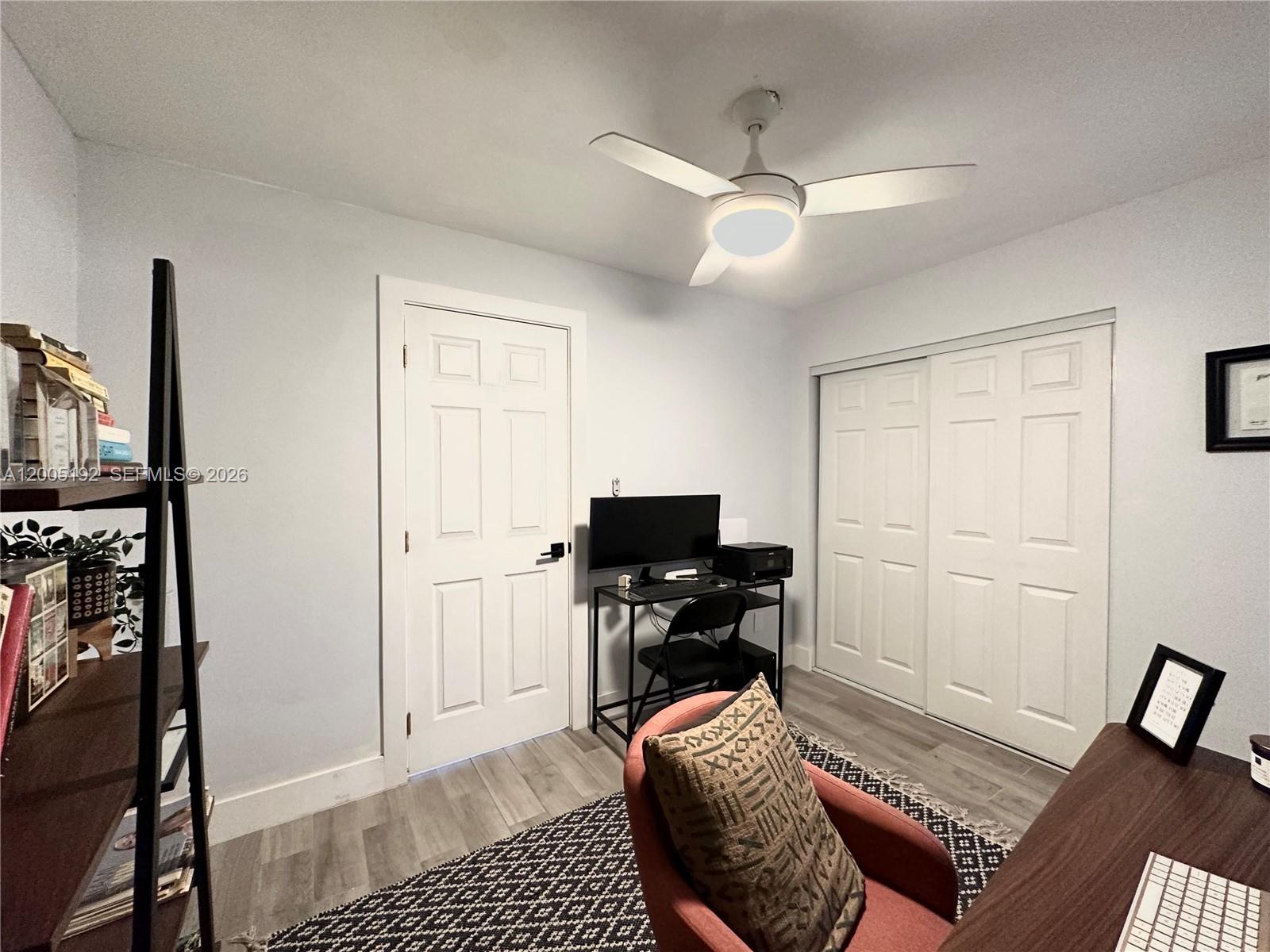 4840 Southwest 149th Court, Unit 16F Miami, FL 33185 - Photo 23 of 33 a bedroom with furniture and a window