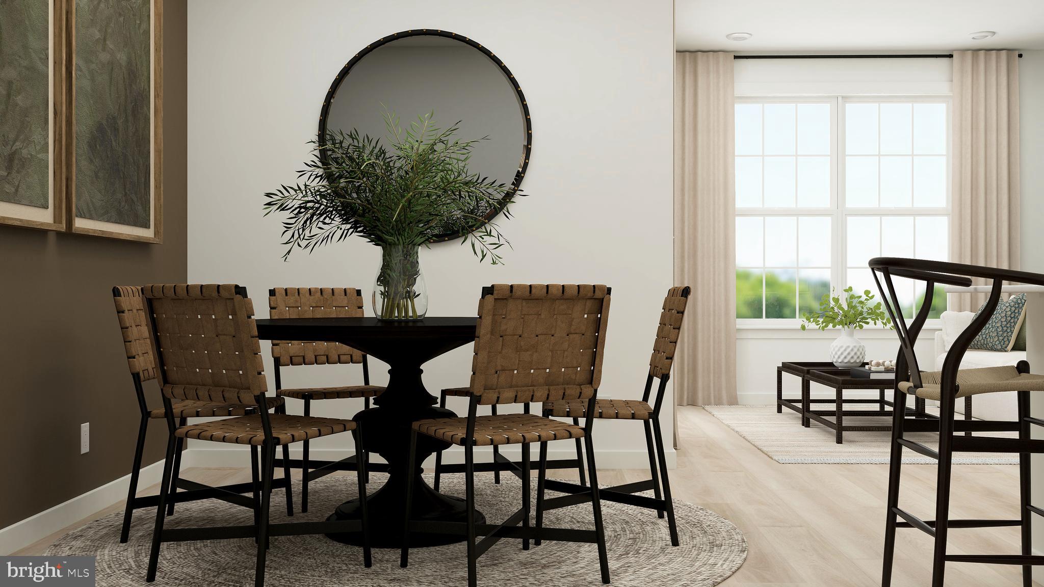 69 Morgans Ml Road Sicklerville, NJ 08081 - Photo 6 of 24 a view of a dining room with furniture and a potted plant