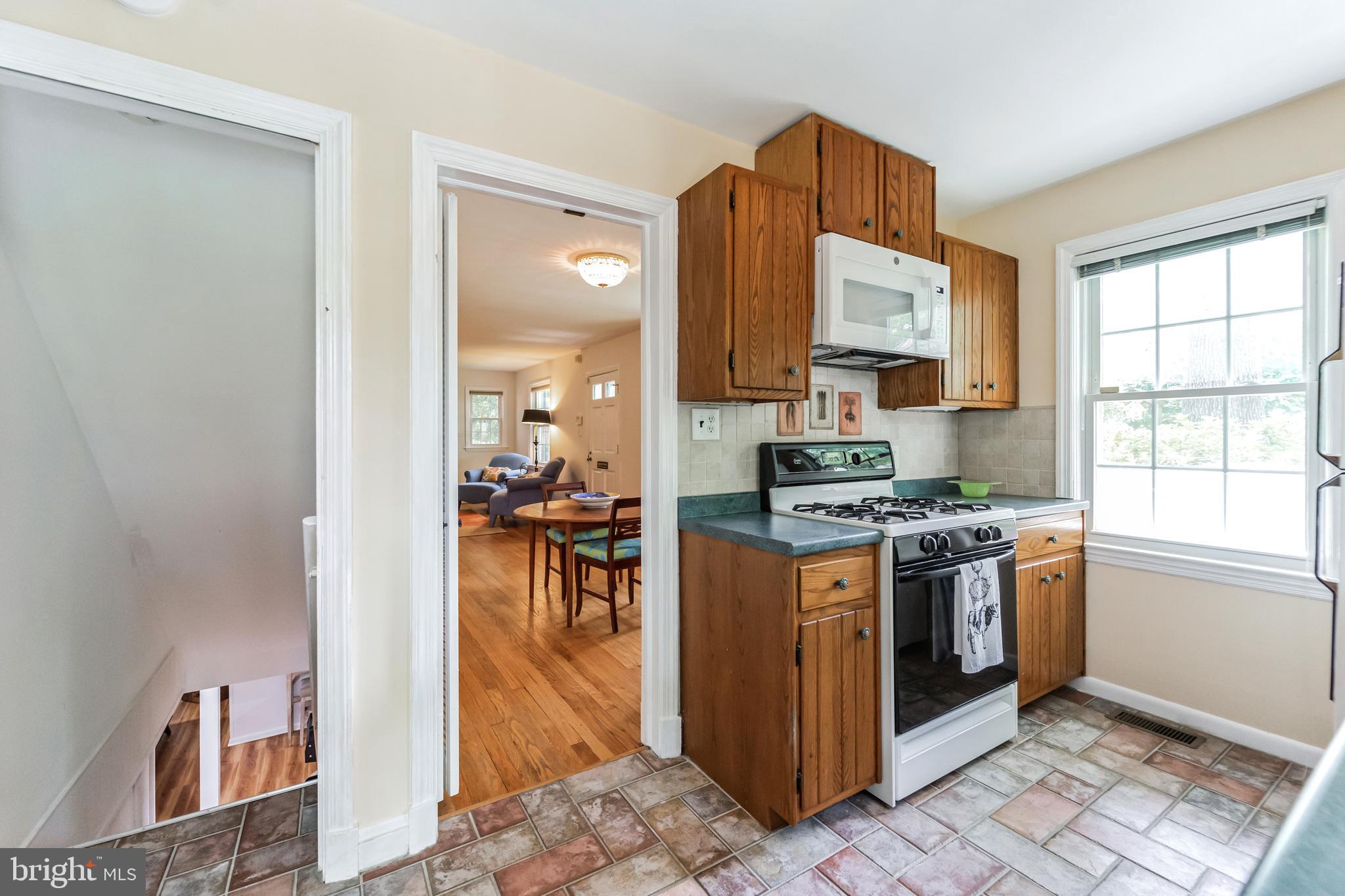 8907 Sudbury Road Silver Spring, MD 20901 - Photo 13 of 29 Gas range and built-in microwave